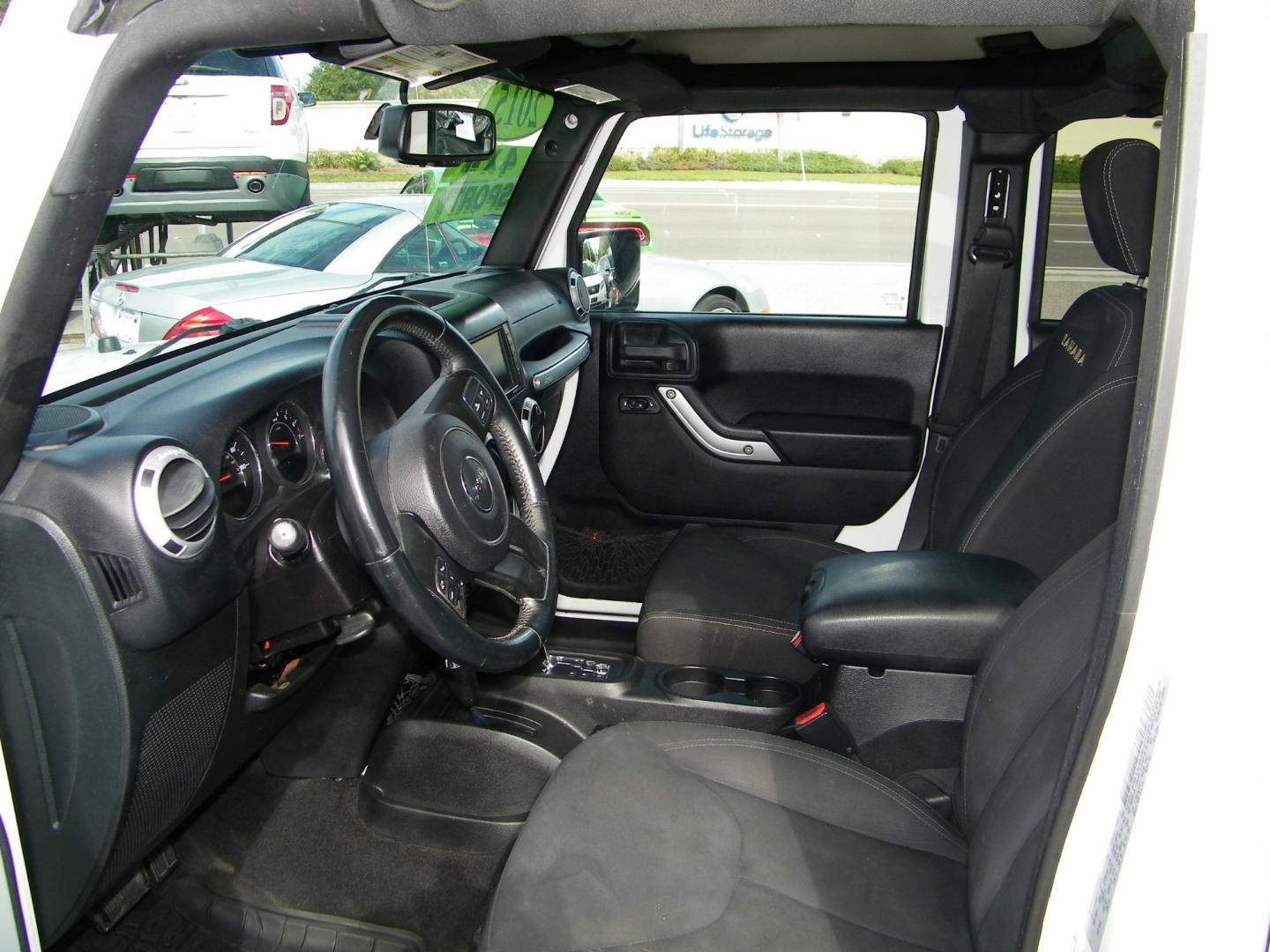 2015 White /Black Jeep Wrangler Unlimited Sahara 4WD (1C4BJWEGXFL) with an 3.6L V6 DOHC 24V FFV engine, Automatic transmission, located at 4000 Bee Ridge Road, Sarasota, FL, 34233, (941) 926-0300, 27.298664, -82.489151 - Photo#19